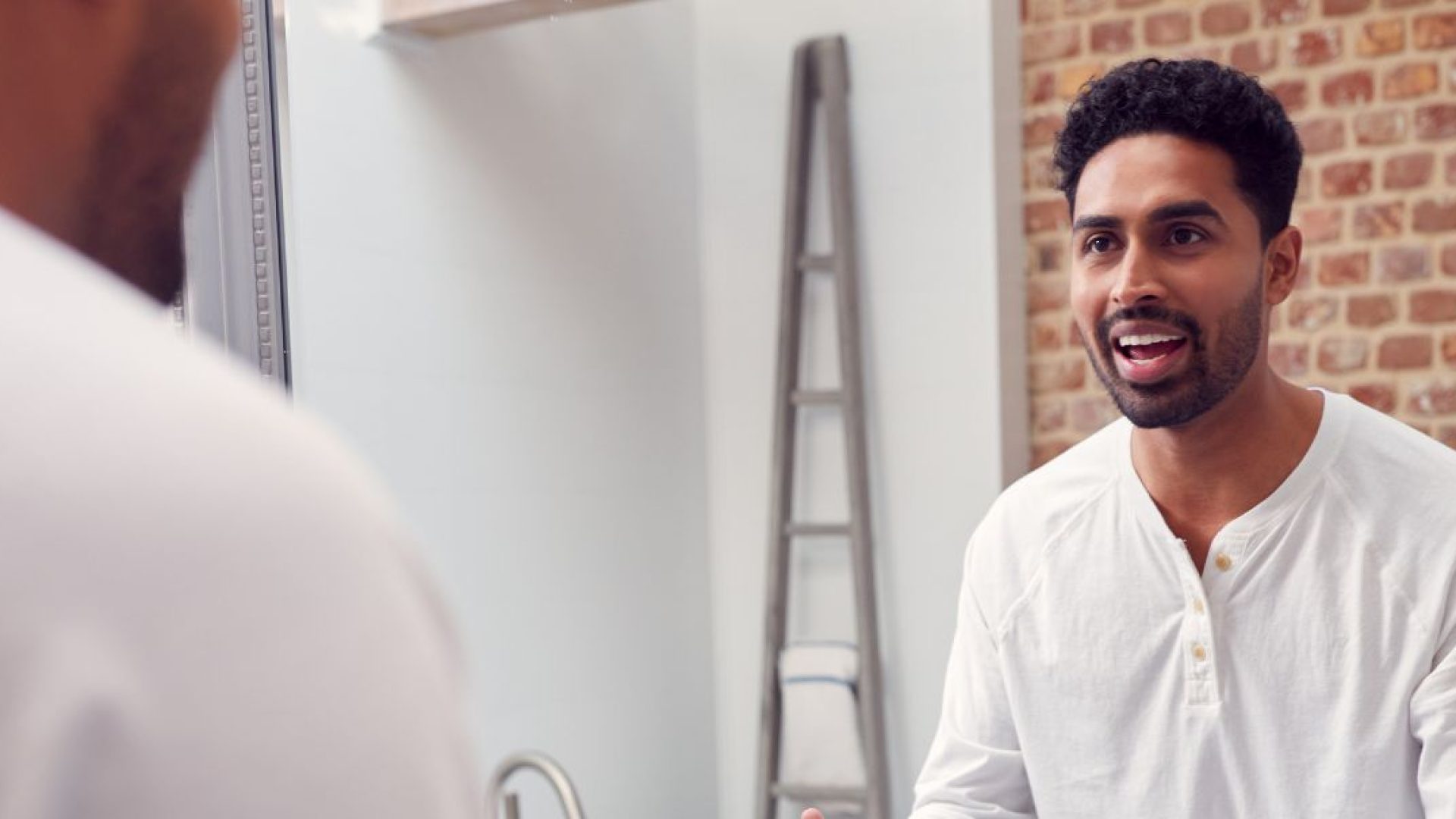 Person looking into the mirror, engaging in dialectical behavior therapy.